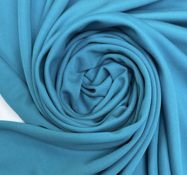 Blått viskose stoff